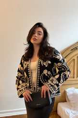 Чорний жакет з молочною вишивкою