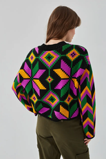 Яскравий светрик з орнаментом